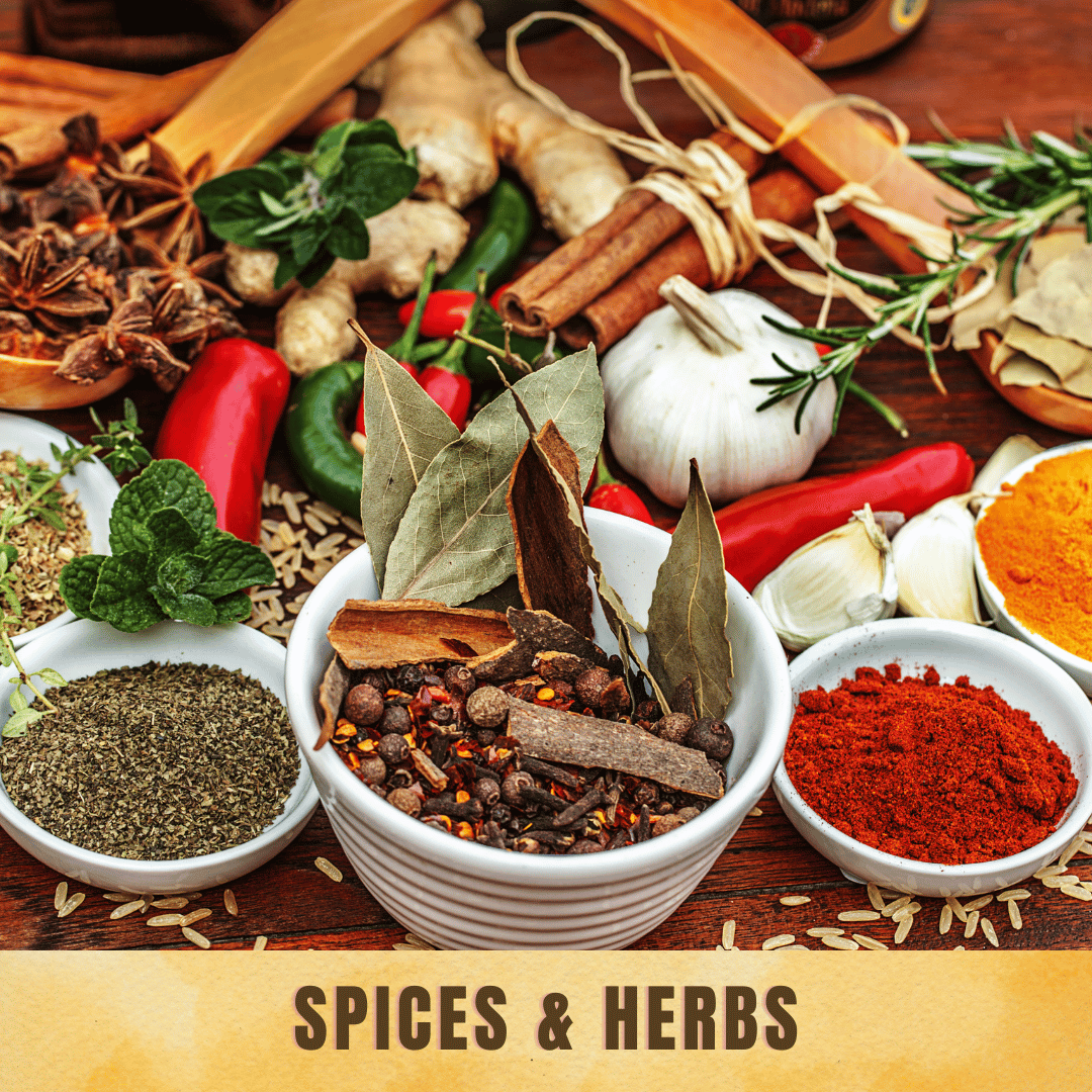 An assortment of organic spices and dried herbs, including turmeric, bay leaves, red chili powder, and cinnamon, for cooking and wellness.